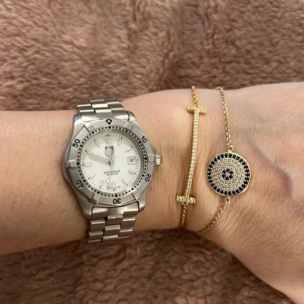 Woman’s Tag Heuer stainless steel watch.
